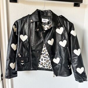 Brand new Lola and the boys black vegan leather moto jacket with white hearts